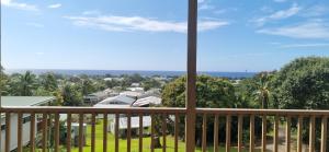 a view from the balcony of a house at Ocean Beach Town View - Infinity Pool in Avarua