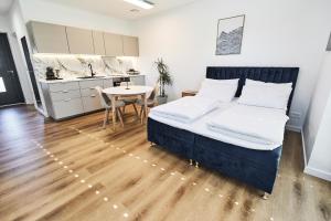 Postel nebo postele na pokoji v ubytování Blue Alpine Nest