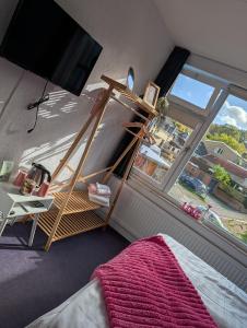 a room with a room with a ladder and a window at Hotel B&B LeLa in Valkenburg +79 photos