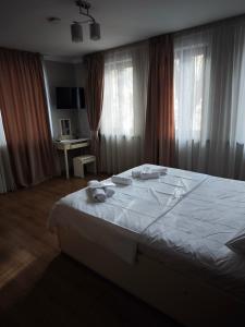 Afbeelding uit fotogalerij van Royal harmony hotel in Itʼkhvisi