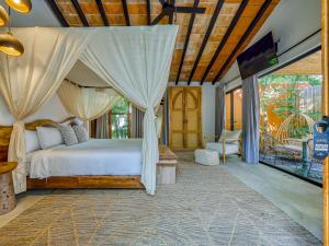 Ένα ή περισσότερα κρεβάτια σε δωμάτιο στο Maxwell Residences at Indah +229 φωτογραφίες