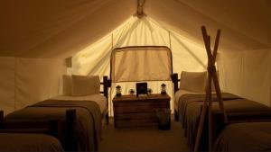 Postel nebo postele na pokoji v ubytování Lompoul Nature