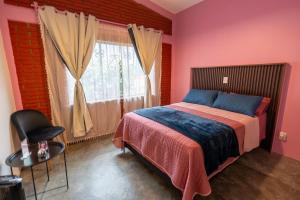 Ένα ή περισσότερα κρεβάτια σε δωμάτιο στο Apartment in Convention Center, Oaxaca