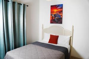 Ένα ή περισσότερα κρεβάτια σε δωμάτιο στο Gated Property Family Ready walk to restaurants AC