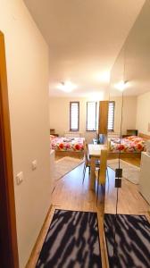 Ένα ή περισσότερα κρεβάτια σε δωμάτιο στο Tulip Studio Deluxe, Grand Resort Pamporovo