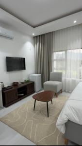 TV a/nebo společenská místnost v ubytování Tranquil Ridge BnB