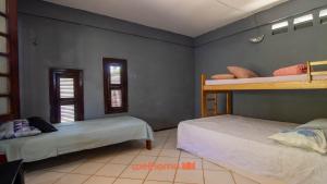 En eller flere senge i et værelse på Casa em Aquiraz com Piscina 10 min do Beach Park