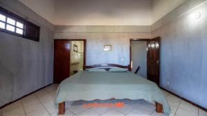 En eller flere senge i et værelse på Casa em Aquiraz com Piscina 10 min do Beach Park