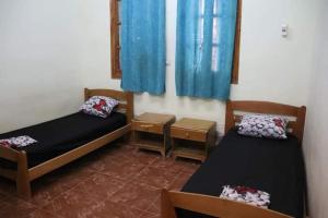 Postel nebo postele na pokoji v ubytování Youth hostel ouargla بيت الشباب 22 فبراير ورقلة