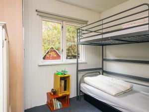 Postel nebo postele na pokoji v ubytování 6 person holiday home in Ørsted-By Traum