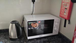 Η κουζίνα ή μικρή κουζίνα στο BaitAlhoor GardenHostel