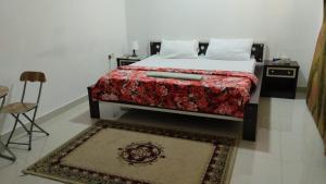 Ένα ή περισσότερα κρεβάτια σε δωμάτιο στο BaitAlhoor GardenHostel