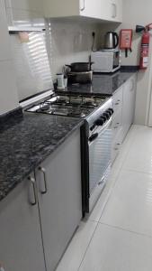 Η κουζίνα ή μικρή κουζίνα στο BaitAlhoor GardenHostel