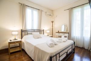 Ένα ή περισσότερα κρεβάτια σε δωμάτιο στο Elia Apartments Chrisso