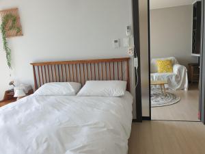 Ένα ή περισσότερα κρεβάτια σε δωμάτιο στο 광안쏠트