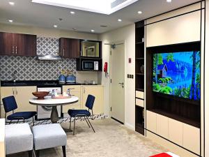 Kuchyň nebo kuchyňský kout v ubytování Hotel Majestic Inn - Madinat Khalifa