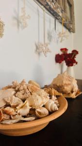 a plate of food with mushrooms on a table at Pousada 100 passos in Tamandaré