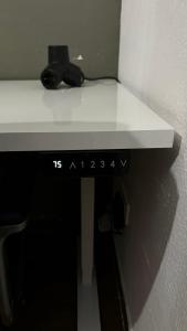 a white counter top with a camera on top of it at Apartamento felicitat in Figueres +7 photos