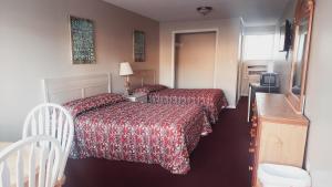 Postel nebo postele na pokoji v ubytování Dolphin Lane Motel + 21 fotografií
