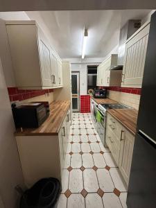 Köök või kööginurk majutusasutuses Alishii home +1 foto