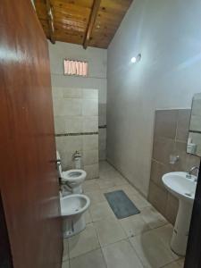 Koupelna v ubytování Complejo los lirios