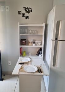 Η κουζίνα ή μικρή κουζίνα στο Cantinho de aconchego 02 - com ar condicionado