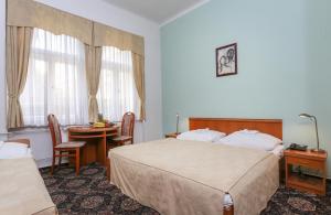 Cama o camas de una habitación en City Club Prague