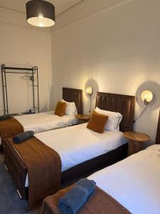 Ένα ή περισσότερα κρεβάτια σε δωμάτιο στο 2BR Flat West End Near Kelvingrove and City Centre +8 φωτογραφίες