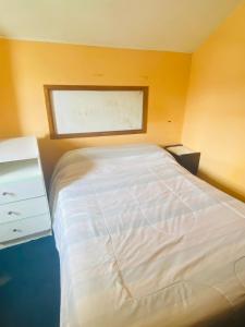 Postel nebo postele na pokoji v ubytování Descanso Fueguino