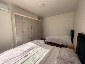 Postel nebo postele na pokoji v ubytování Vista Espetacular