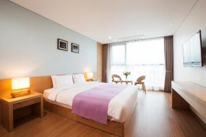 Postel nebo postele na pokoji v ubytování YOUUS Hotel + 37 fotografií
