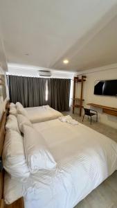 Ένα ή περισσότερα κρεβάτια σε δωμάτιο στο Vida Playa El Agua