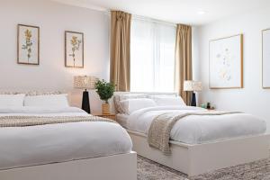 Giường trong phòng chung tại Premium 4-bedrooom House Best Location