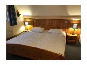 Ένα ή περισσότερα κρεβάτια σε δωμάτιο στο Huijsmansverhuur Type Premium de Luxe Grevelingen 37