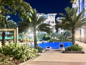 Bazén v ubytování Celandine Residence by DMCI nebo v jeho okolí