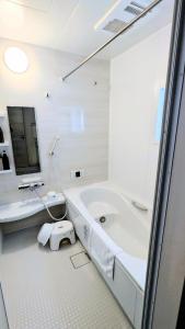 Ένα μπάνιο στο Chatan Beachside House