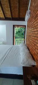 Ένα ή περισσότερα κρεβάτια σε δωμάτιο στο Villa Campestre Eagle +16 φωτογραφίες