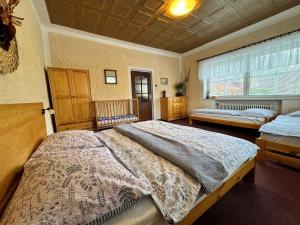 Postel nebo postele na pokoji v ubytování Apartment in Smrzovka 51888