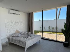 Ένα ή περισσότερα κρεβάτια σε δωμάτιο στο Dar Lilla