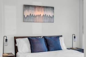 Ένα ή περισσότερα κρεβάτια σε δωμάτιο στο Urban Pro Suites