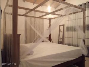 Ένα ή περισσότερα κρεβάτια σε δωμάτιο στο Angel home villa