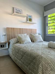 Postel nebo postele na pokoji v ubytování Orillas del Sol Triplex