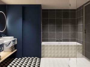 Koupelna v ubytování Mercure Hotel Den Haag Central + 37 fotografií