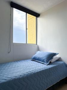 Ένα ή περισσότερα κρεβάτια σε δωμάτιο στο Close to shopping malls and the airport +17 φωτογραφίες