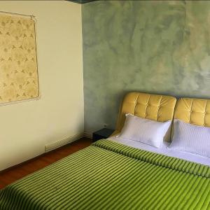 En eller flere senge i et værelse på Apartament Salcia