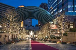 a city street with christmas lights and trees at オーブリオン恵比寿203 in Tokyo
