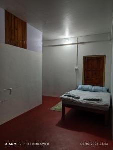 Postel nebo postele na pokoji v ubytování MR SWER Homestay