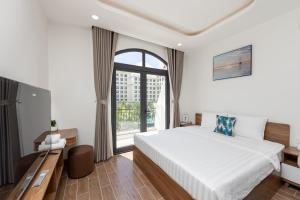 Μια τηλεόραση ή/και κέντρο ψυχαγωγίας στο RAINBOW Motel 3