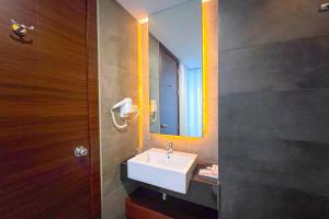 Koupelna v ubytování Asialink Hotel Batam by Prasanthi