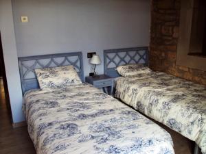 Postel nebo postele na pokoji v ubytování Ana de las Tejas Azules